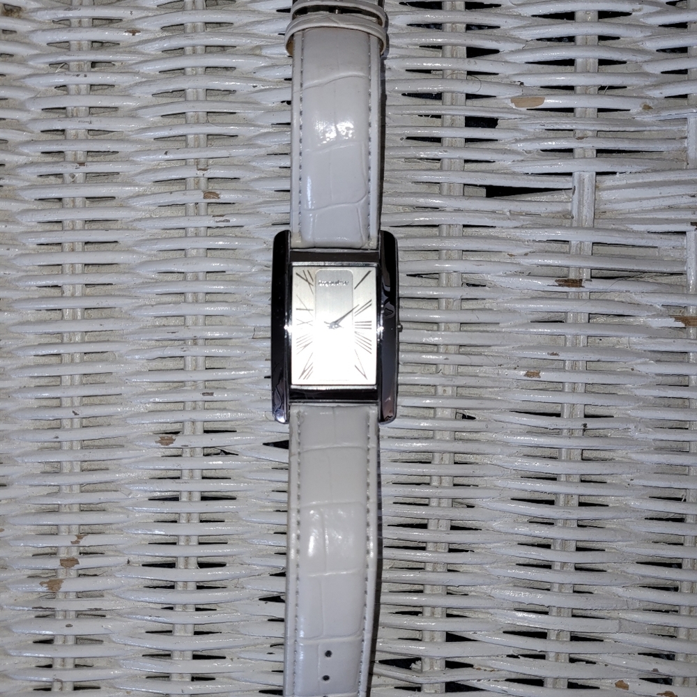 Slim, Impulse rectangular watch. Needs new battery